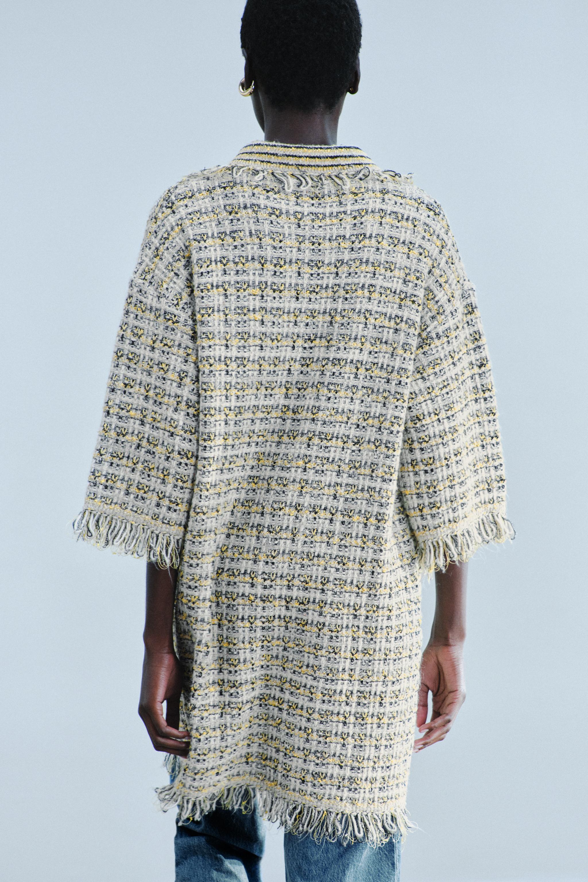 ROBE EN MAILLE STRUCTURÉE EFFRANGÉE